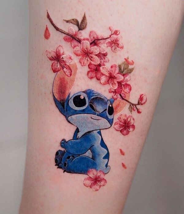 Stitch tattoo with flower