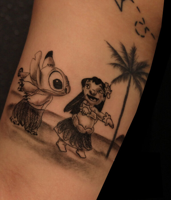 Stitch tattoo with palm tree