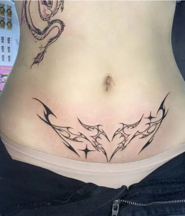 Succubus womb tattoo