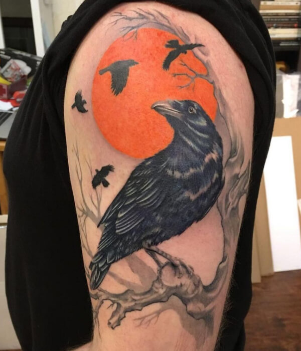 Sun raven tattoo