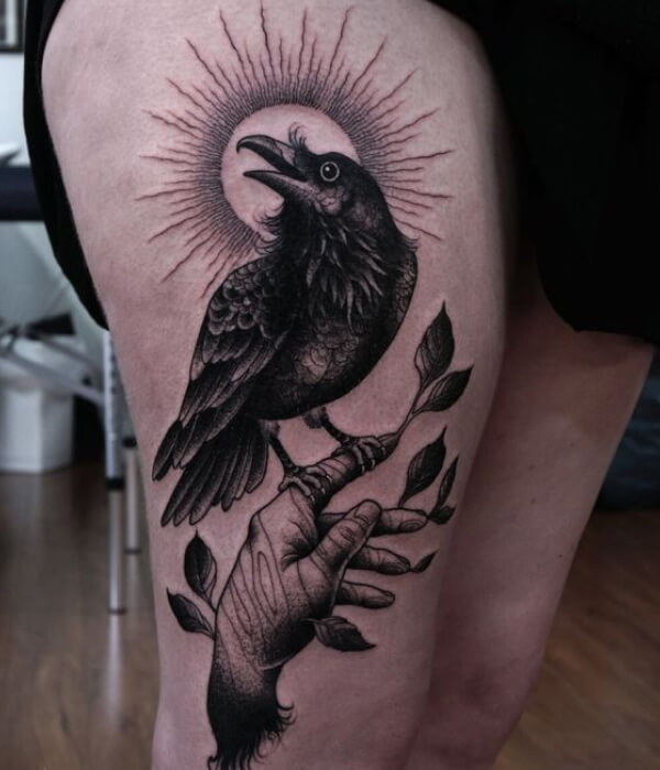 Sun raven tattoo