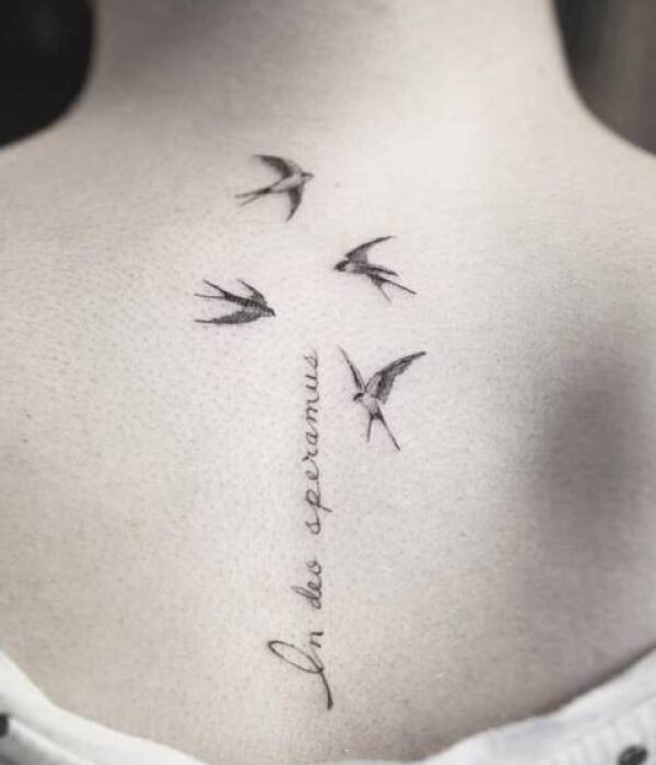Swallow bird tattoo with quote