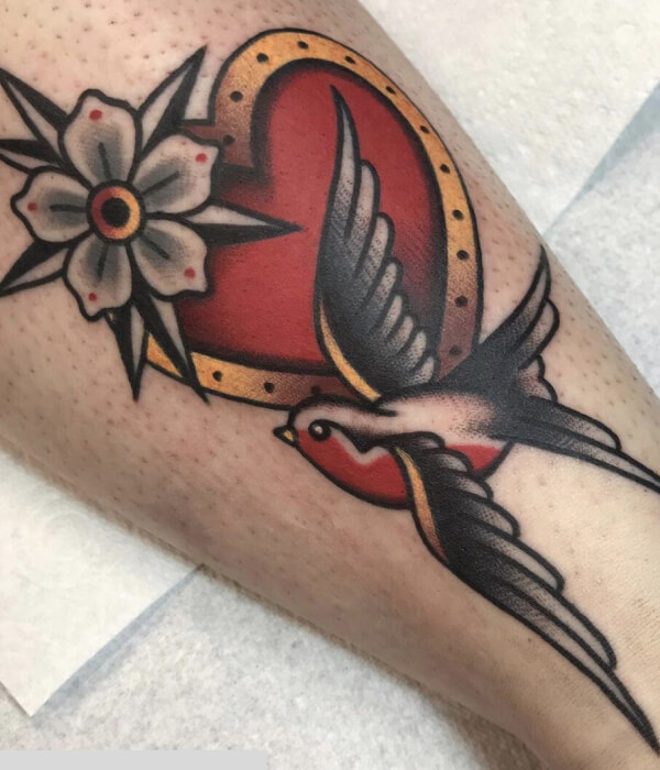 Swallow tattoo design with heart