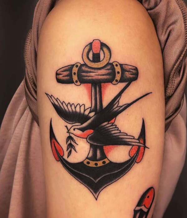Swallow tattoo with anchor
