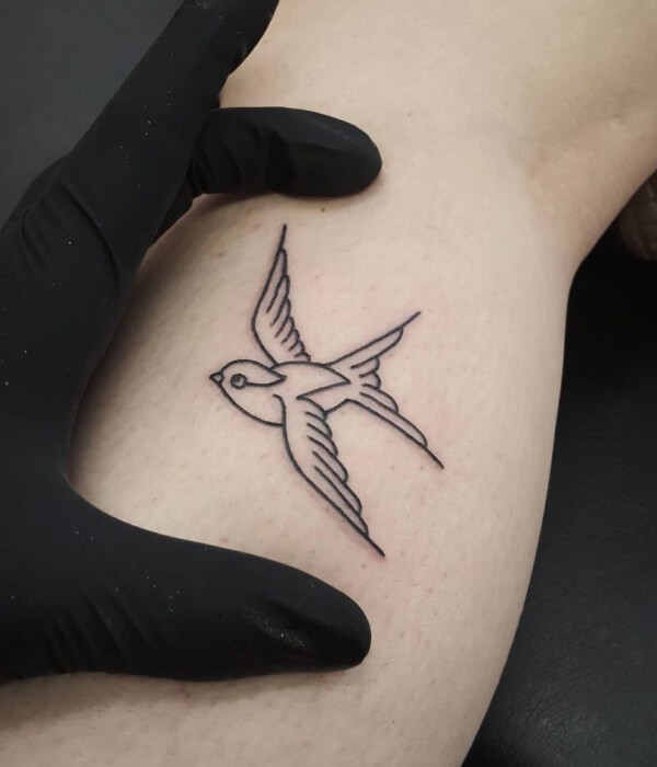 Tiny swallow tattoo design