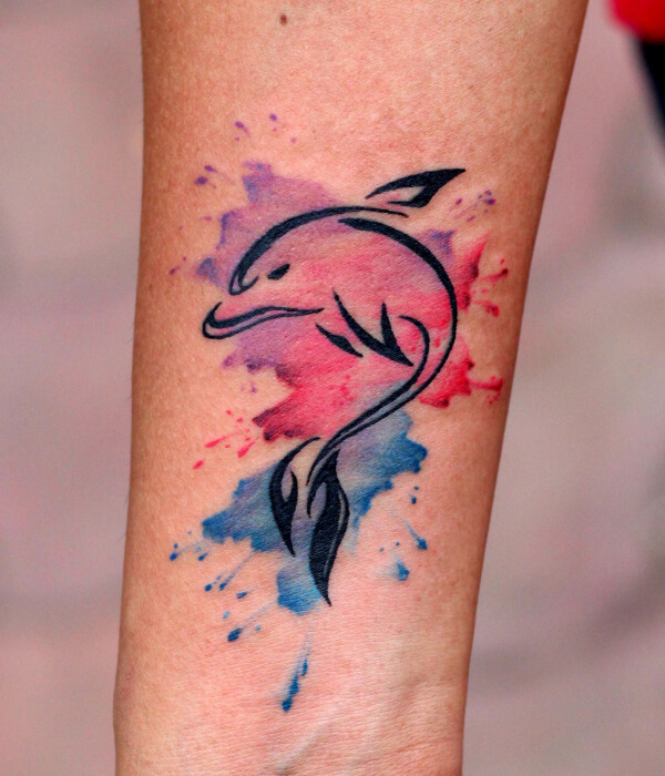 Watercolor dolphin tattoo