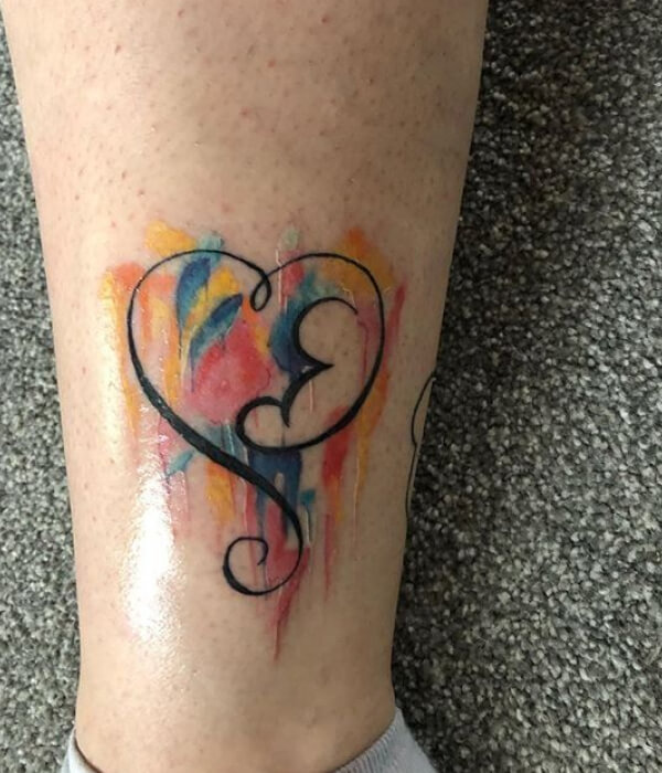 Watercolor womb tattoo