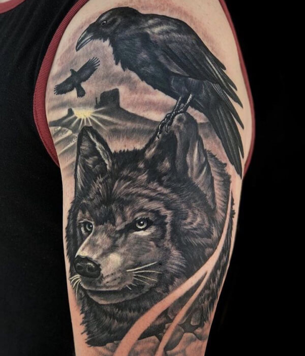 Wolf with raven tattoo