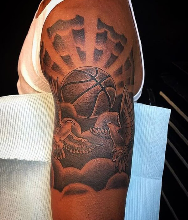 Basketball tattoo with clouds arm tattoo