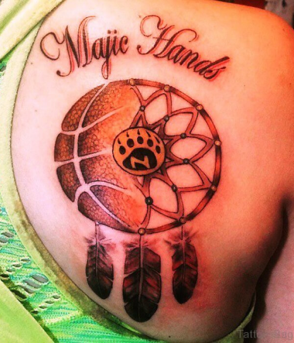 Basketball tattoo with feathers