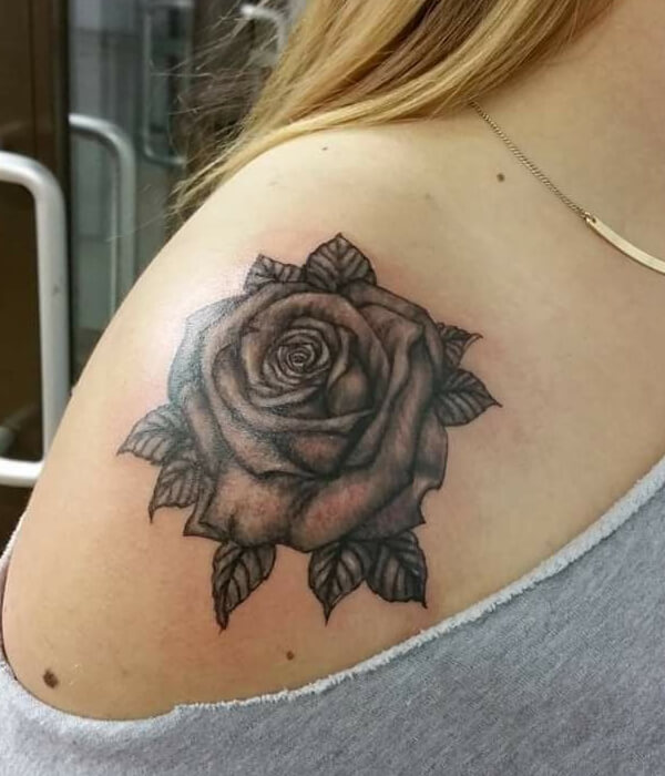 Black Ink Shoulder Flower Tattoo