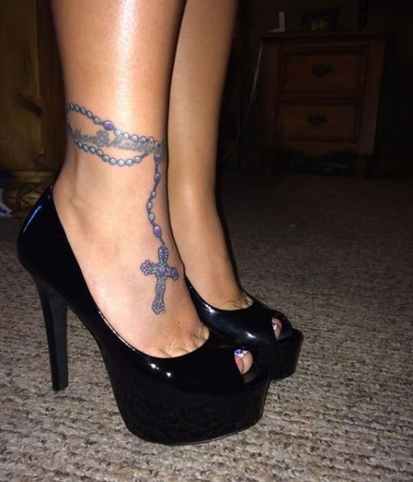 Cross tattos on foot