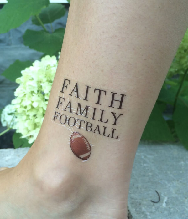 Football tattoo with Inspirational Quote
