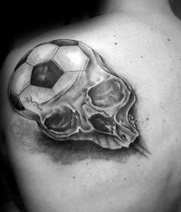 Football tattoo with a skull