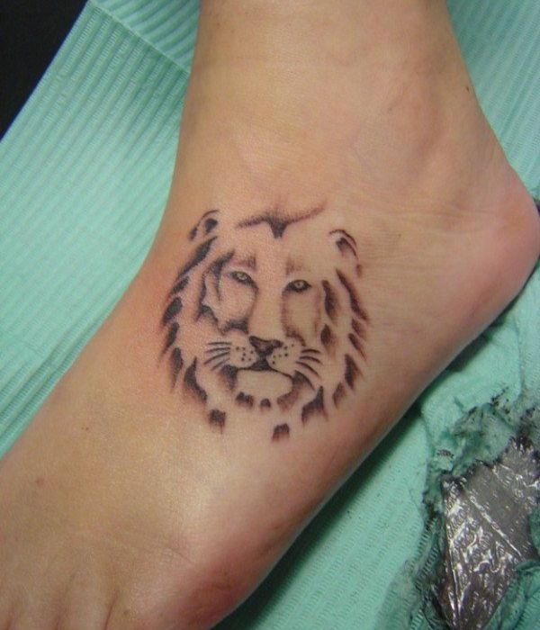 Lion foot tattoos