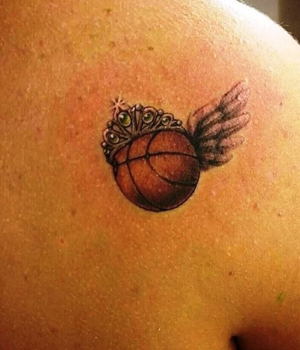 Little Crowned Basketball With Wings Tattoo