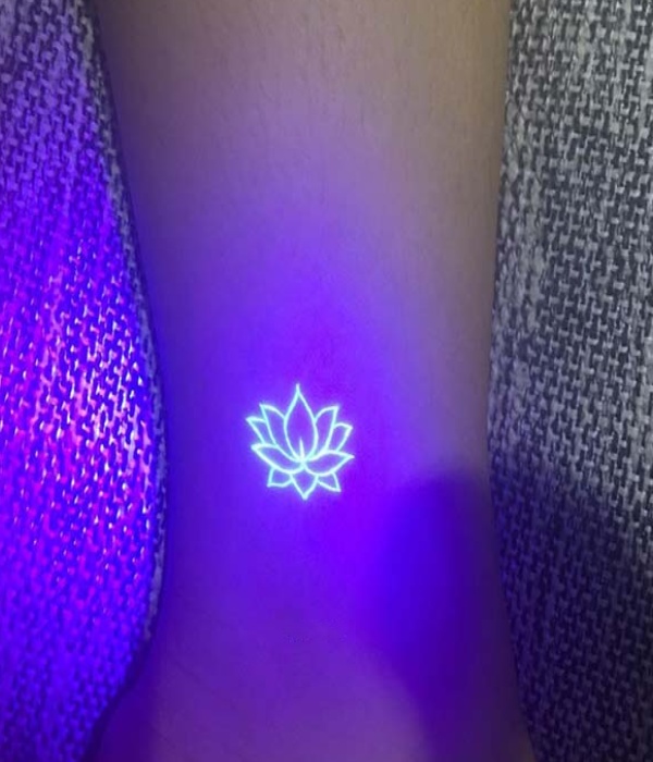 Lotus UV hand Tattoo