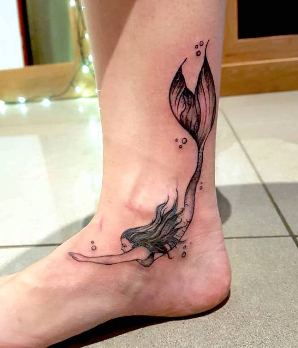 Mermaid tattoos on foot