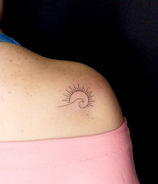 Minimalist Sun women tattoo