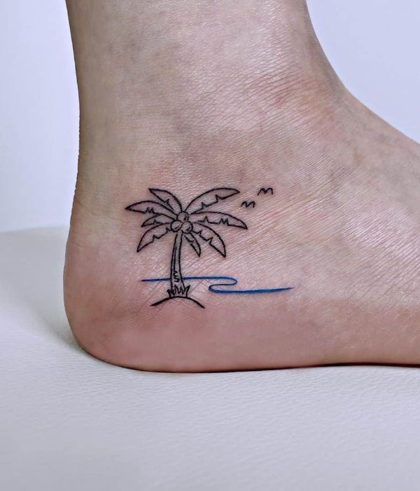 Palm tree foot tattoo