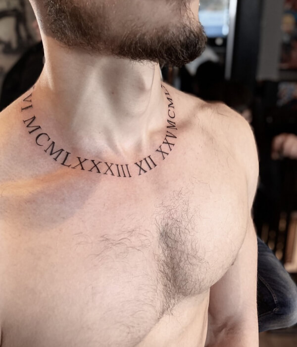 Round Roman Numerals Collarbone Tattoo