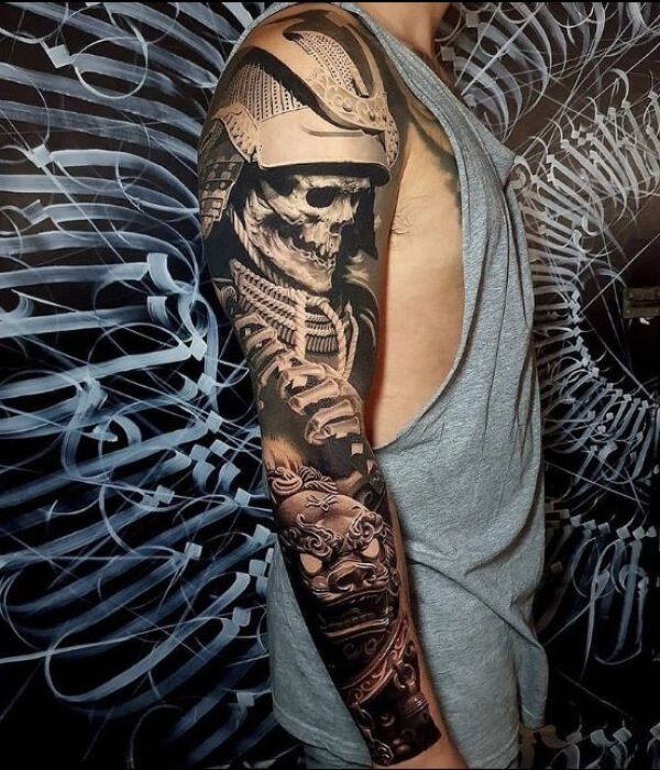 Skull full sleeve with bons tattoo