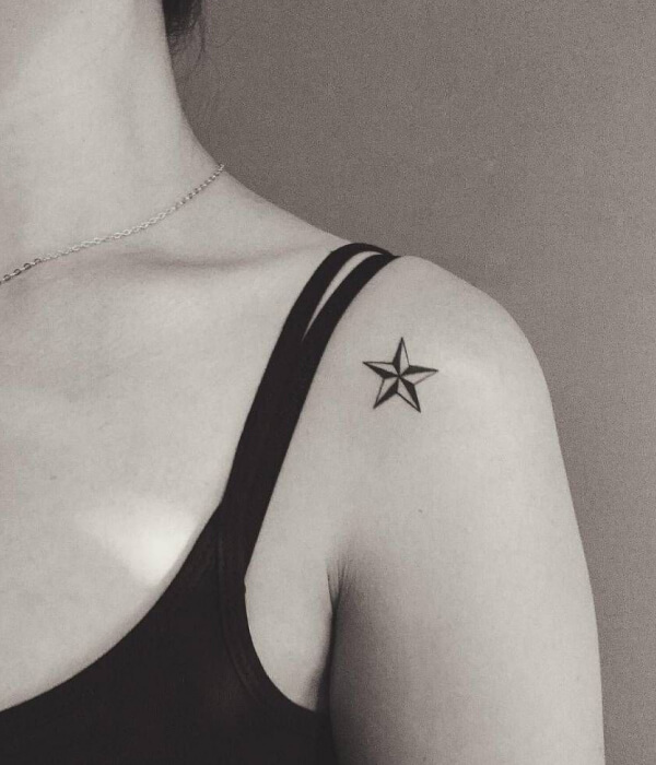 Small star tattoo