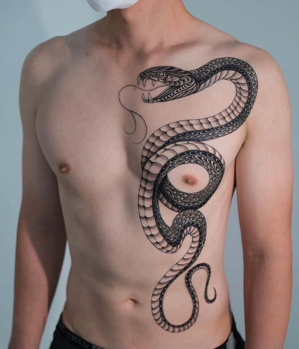 Snake chest tattoo