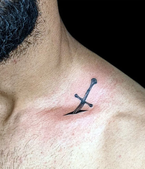 Sword on Collarbone Tattoo