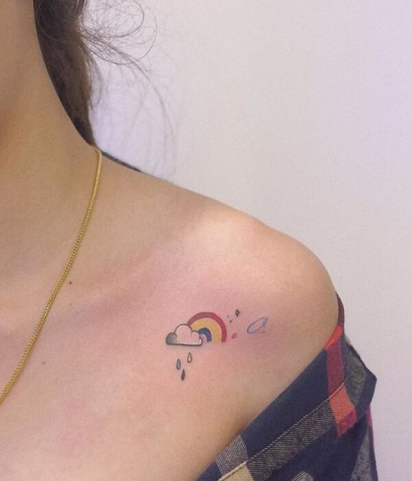 Tiny rainbow tattoo for women