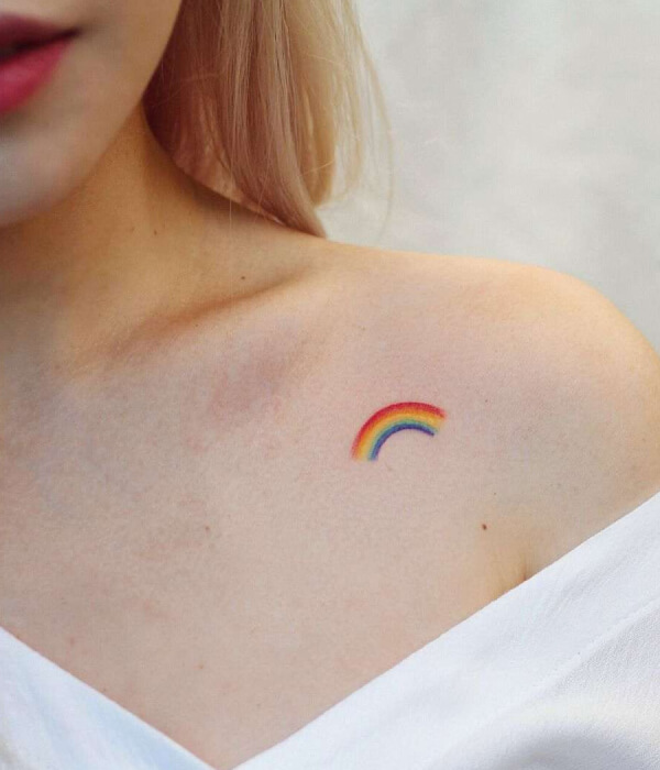 Tiny rainbow tattoo