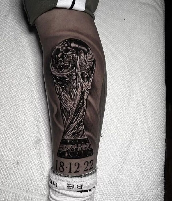 Trophy or Cup on leg tattoo