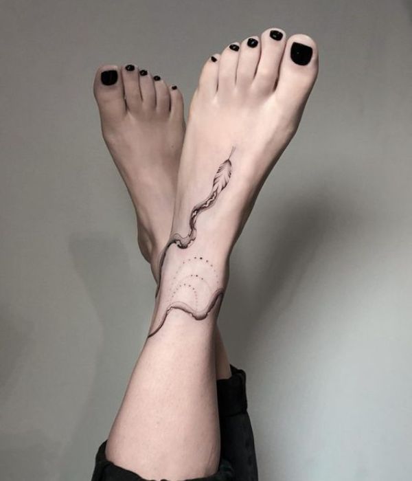 snake foot tatoos