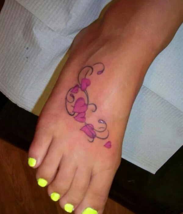 tiny heart foot tattoo