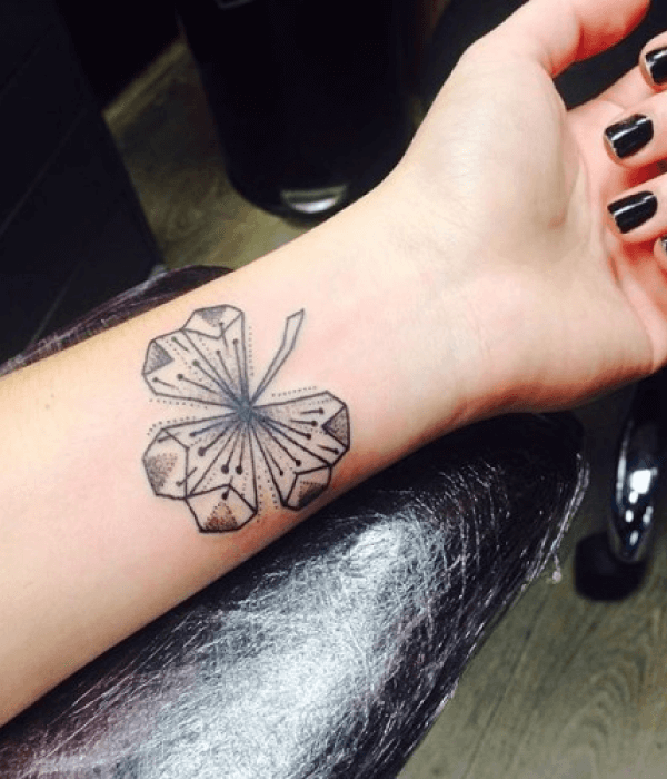 Geometric clover leaf tattoo design
