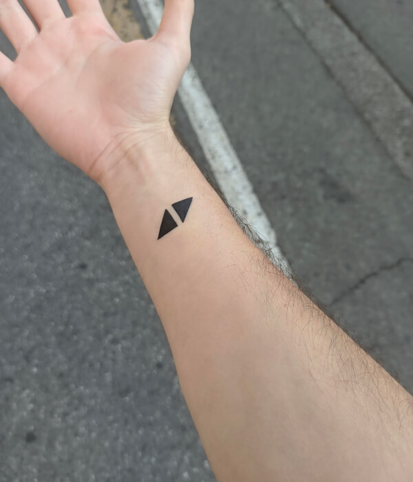 Tiny Triangle Tattoo on hand