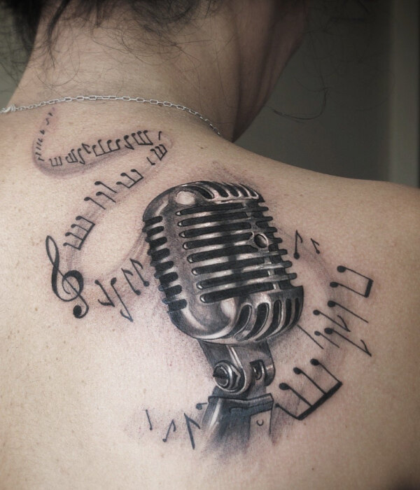 Back Mic Tattoo