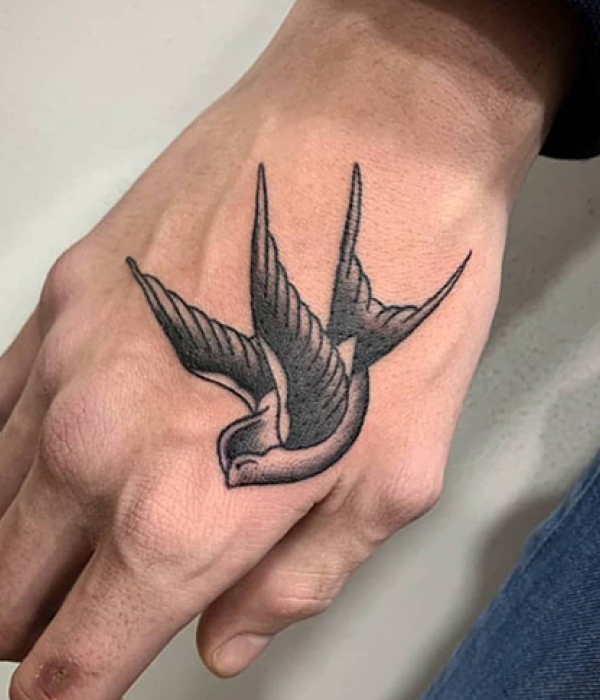 Bird palm tattoo