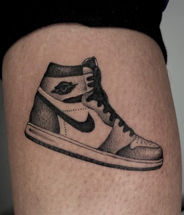 Black and White Shoe on arm Tattoo