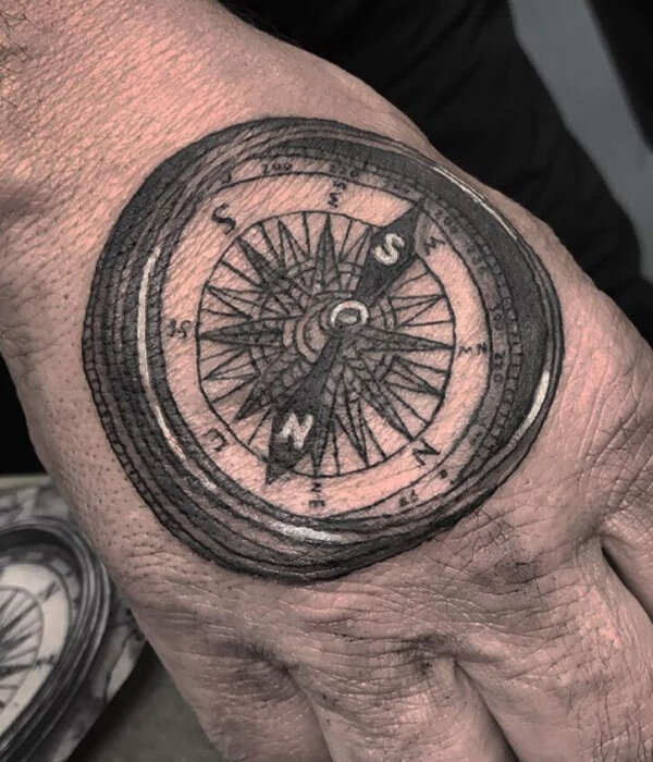 Compass palm tattoo