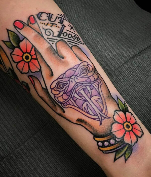 Cross-Finger Tattoo with Flowers