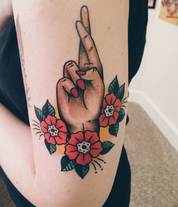 Finger Crossed Tattoo with Red Nails
