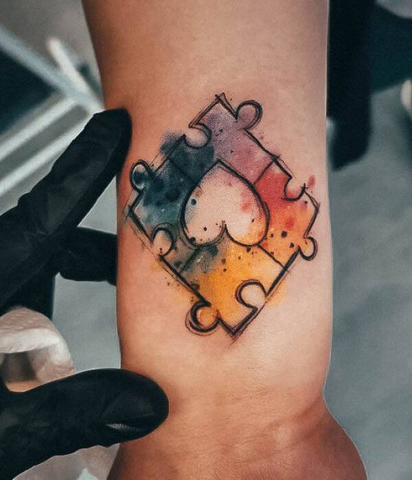 Heart Puzzle Piece Tattoo