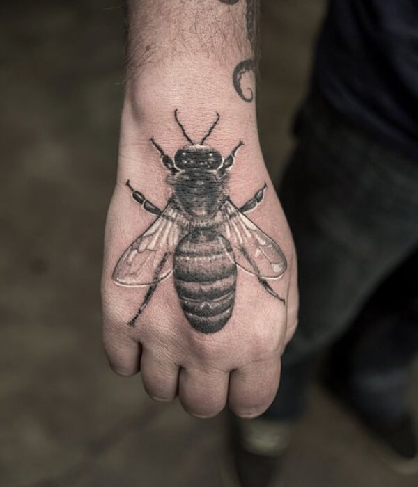 Insect palm tattoo