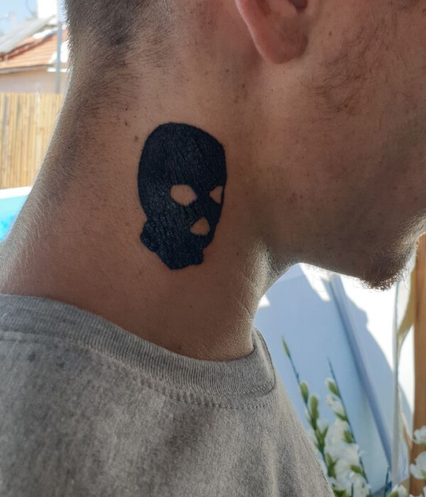 Minimalistic Ski Mask Tattoo