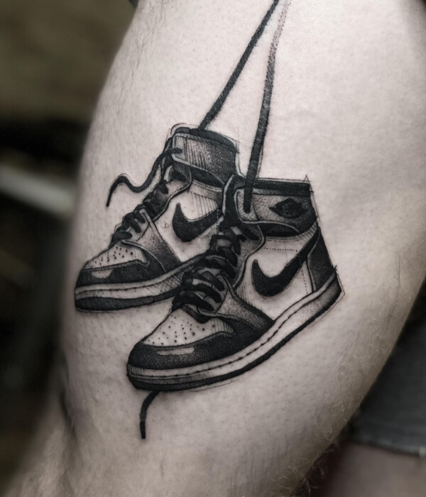 Realistic Shoe arm Tattoo