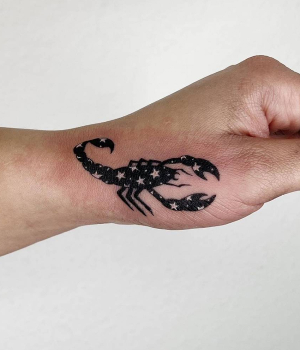 Scorpio palm tattoo