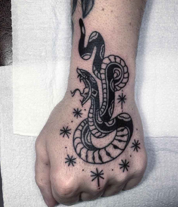 Snake palm tattoo