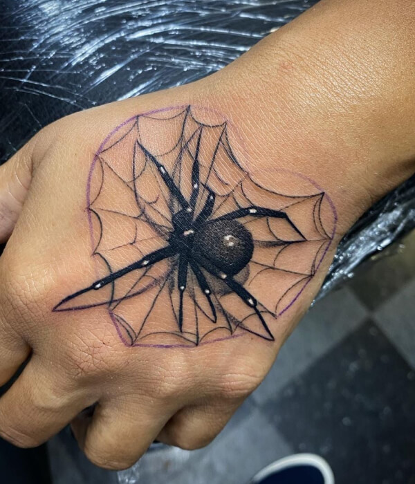 Spiderweb palm tattoo