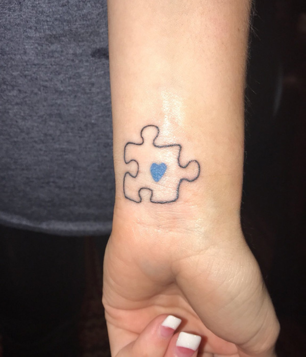 Wrist Puzzle Tattoo design